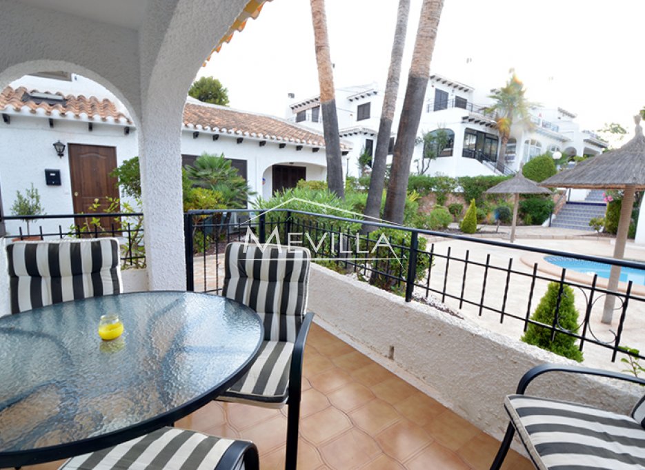 a balcony with views to the swimming pool 