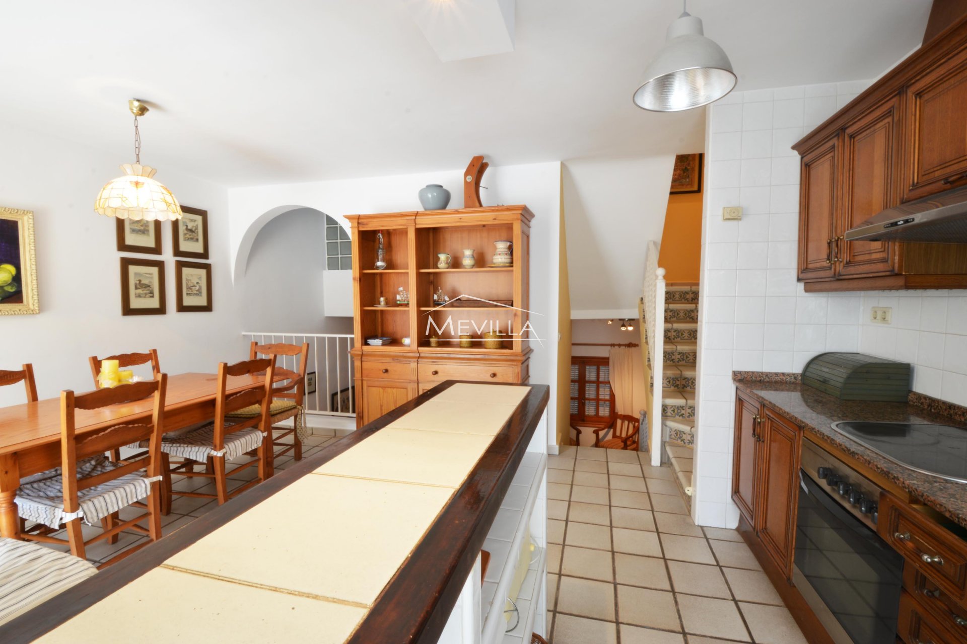  La cocina  con el comedor