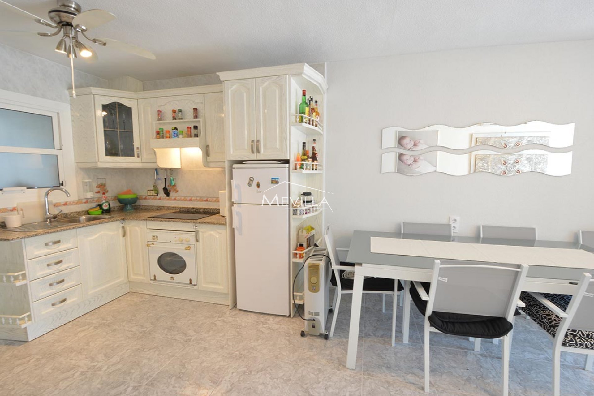 The kitchen with dining area