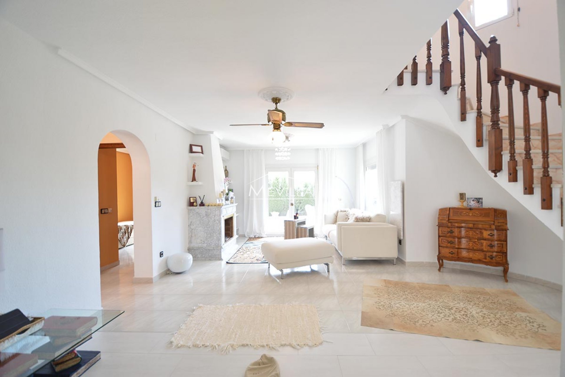 The living room with a fireplace