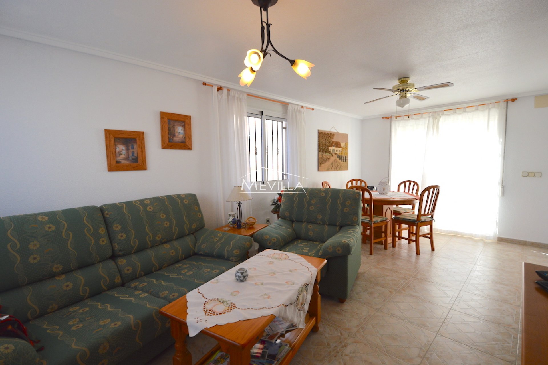 The living room with dining area