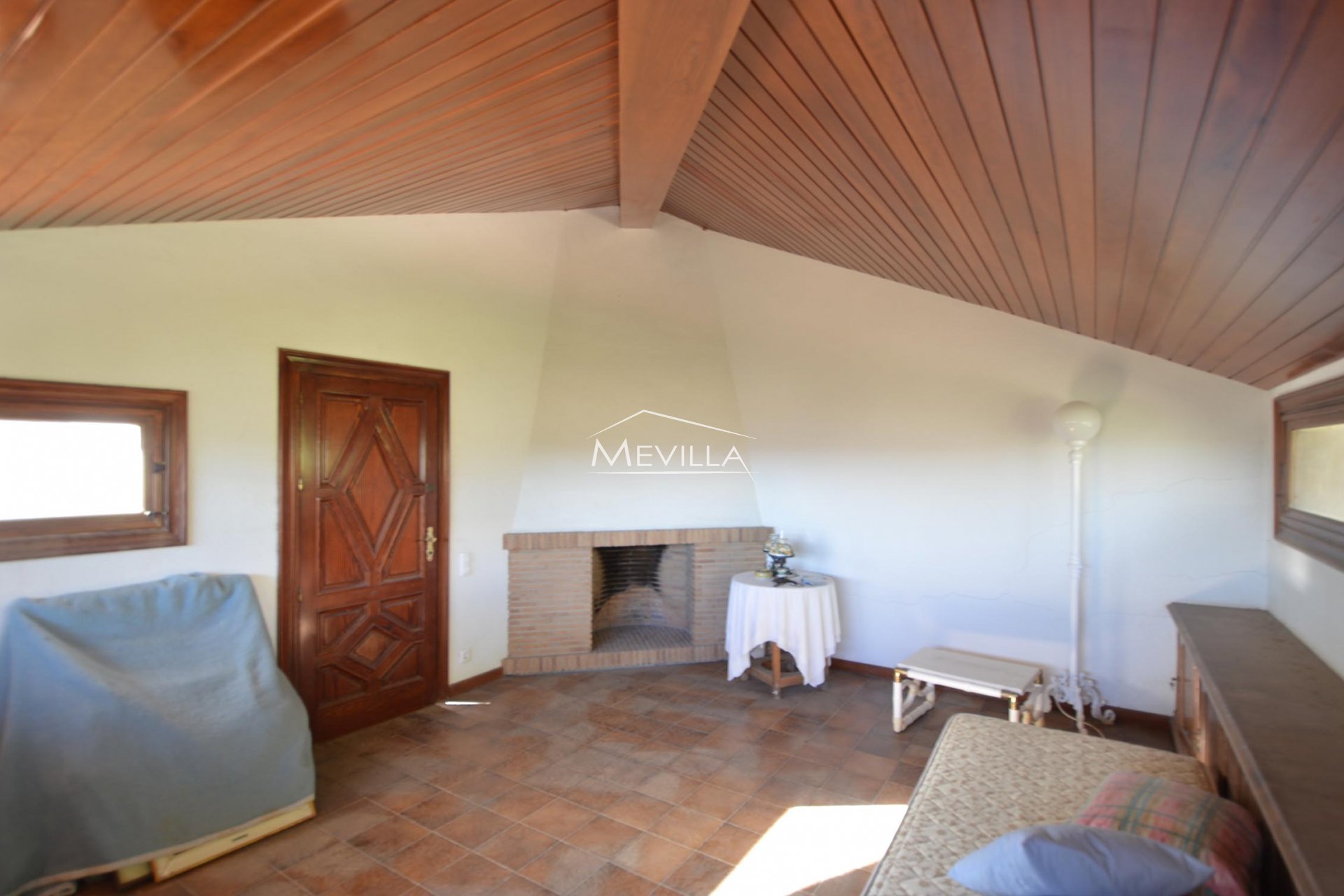 The living room with fireplace