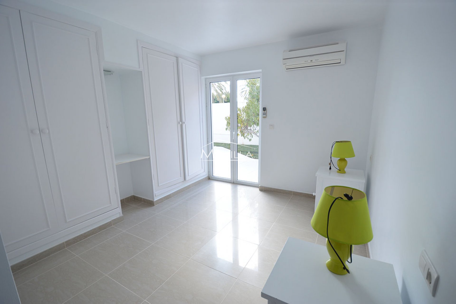 The second bedroom on the first floor 