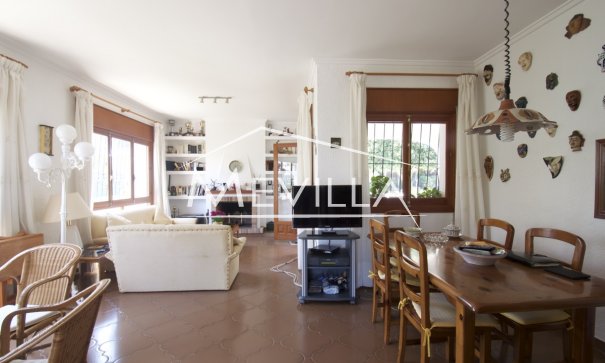 The living room with dining area 